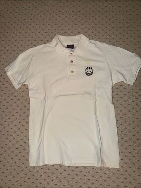 White Spitfire Polo Shirt with Embroidered Flame Face Logo